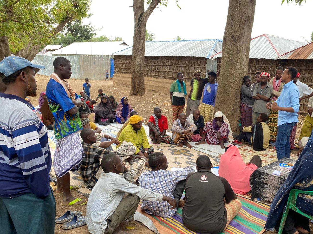 Farmers and community members meeting with a KPHF officer in Bacaadley village